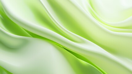 Obraz premium Light green silk satin background with elegant waves creating a delicate and luxurious backdrop for various design projects