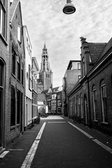 Obraz premium Groningen, cycling city of the Netherlands. View of the tower of University of Groningen in the background