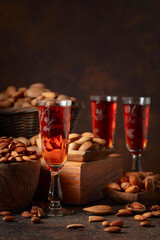 Italian liqueur Amaretto with almonds nuts.