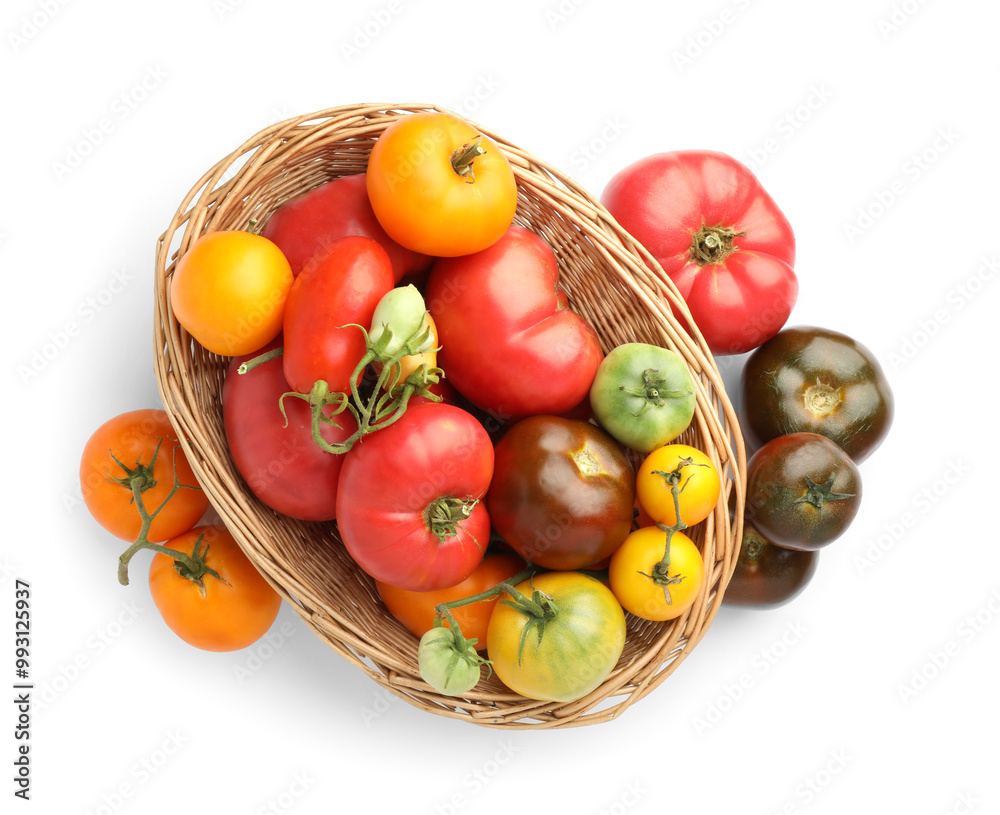 Sticker Different ripe tomatoes in basket isolated on white, top view