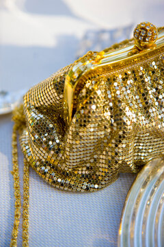 Gold chain mail handbag with rhinestone ball clasp
