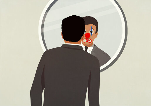 Businessman looking at clown face reflection in mirror
