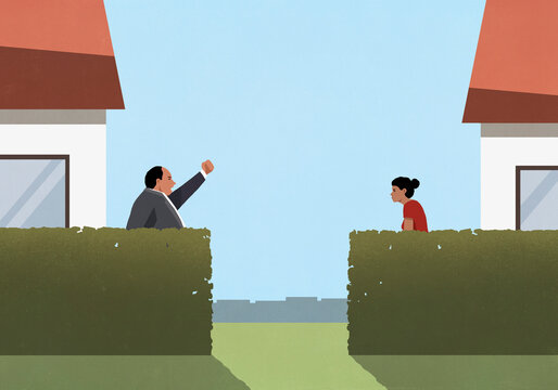 Angry man behind hedge yelling with fist raised at neighbor
