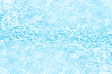 Blue water with ripples on the surface. Defocus blurred transparent blue colored clear calm water...