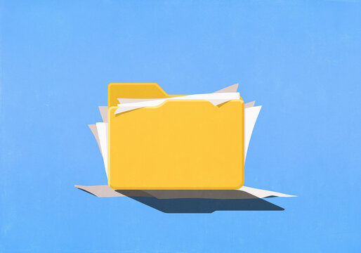 Paperwork spilling out of folder on blue background

