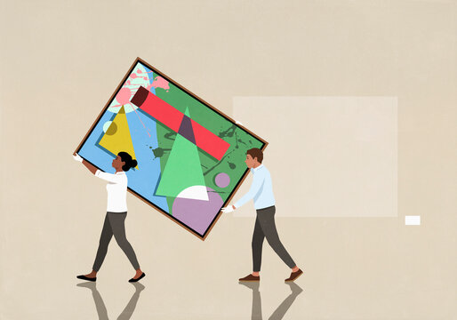 Workers in white gloves removing abstract painting from wall in art museum
