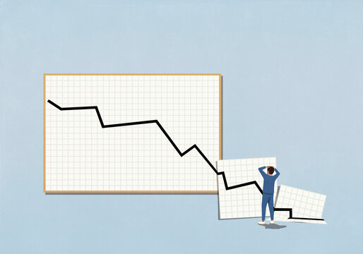 Surprised, disappointed man looking at extended chart with descending line

