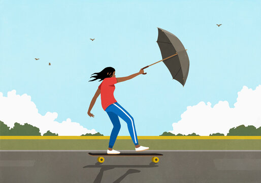 Girl skateboarding, using umbrella as sail on rural sidewalk
