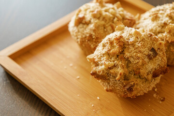 Coconut and Banana Muffins with Walnuts Close-Up