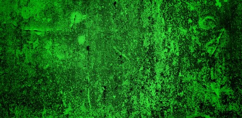 the long wall background is green, blank uncoated canvas or scrim for background long and wide panoramic banner background from rough linen dark green cloth or burlap