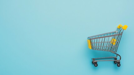 Colorful Shopping Bags and Cart on Minimalist Blue Background for Online Retail and E-commerce