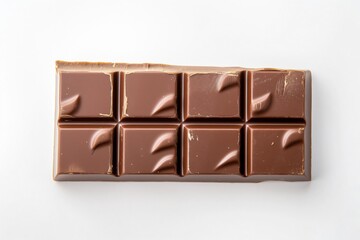 Fototapeta premium Tempting milk chocolate bar on a white background, perfect for indulging in a sweet treat