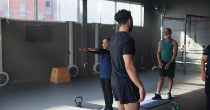 Coach, high five and man with group in gym for training, people and celebration for goal at club in retirement. Person, elderly men and women for diversity with success, exercise and fitness in class