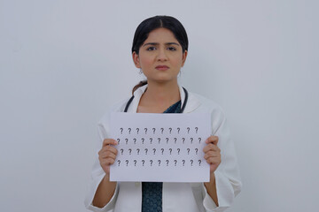 Cofused Indian Female Doctor Holding Question Mark Poster