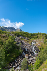 Landscape with Sorvagen waterfall near Munkebu-stig. Sorvagen in Lofoten district of Norway
