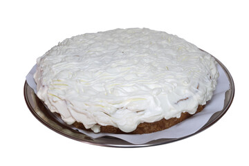 sponge cake with whipped cream. Uncut round cake with white whipped cream topping on large metal  tray covered with paper. isolated on white background