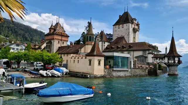 Switzerland .Most beautiful medieval castles of Europe - Oberhofen in Thun lake , Bern canton