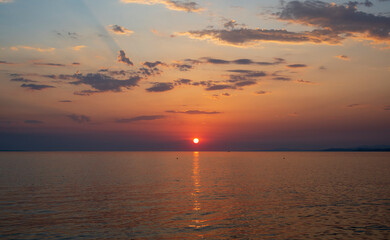 Spectacular sunset on the sea. Greece, Neos Marmaras.	