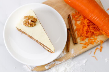 Slice of sweet carrot cake. Closeup.