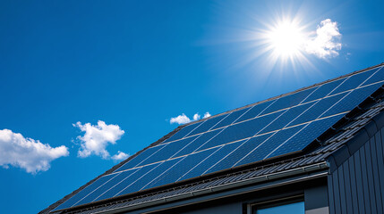 Photovoltaic solar panels installed on the roof of a private house to produce clean, ecological electricity on a sunny summer day