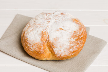 Fresh homemade crisp bread on napkin, top view. Healthy unleavened bread. French bread. Top view Bakery products