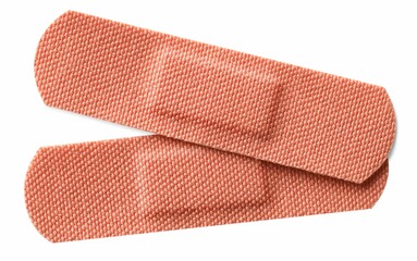 Medical adhesive bandages isolated on white, top view