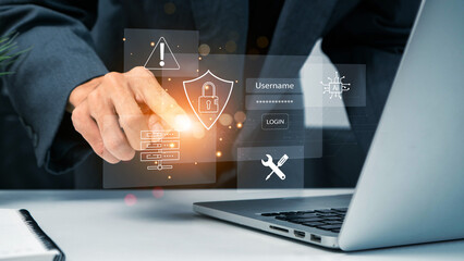 Cyber security, Business, technology, internet network, software development, digital data protection concept. Businessman working on laptop computer in office with pop up antivirus system