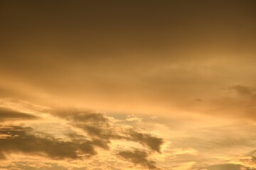 orange dark rain cloud floating on sky at sunset in evening