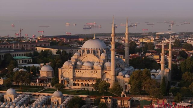 Beautiful Aerial View Above Suleymaniye Mosque at Sunrise, Oil Tanker Ships in Background