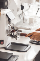 Automatic Coffee Grinder Effortlessly Dispensing Fresh Espresso Grounds Into Portafilter