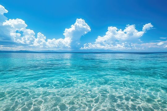 Crystal clear water meeting blue sky on the horizon