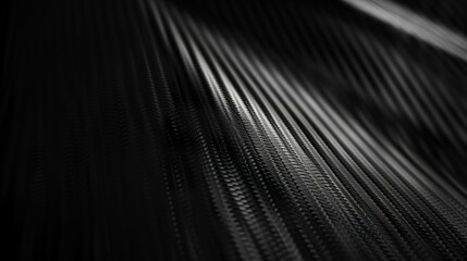 Elegant black abstract background featuring a light carbon fiber texture and gradient