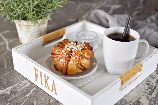 Swedish cinnamon bun with coffee. Swedish fika