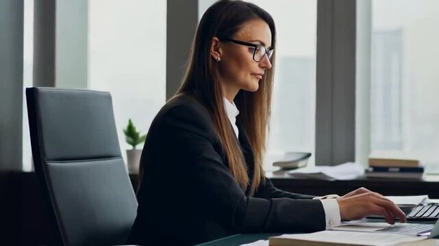 Businessman at a corporate office desk using a laptop for communication and planning. Lawyer analyzing client portfolios and legal cases online at the firm.