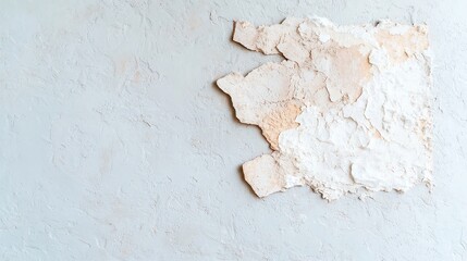 Textured Grey and Brown Wall, featuring a rough and chaotic blend of varied textures, creating an intriguing visual experience of depth and complexity.