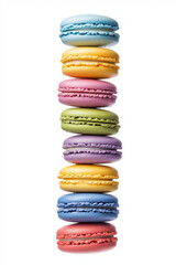 Different colors macarons arranged in vertical pile tower, smooth texture with creamy filling.