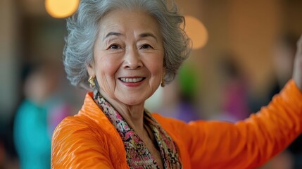 Vibrant Asian seniors participating in a lively dance class moving with energy and grace