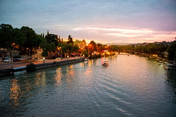 Evening view of the Kura River from the Freedom Bridge in Tbilisi. The city center of the capital of Georgia. © zoyas2222