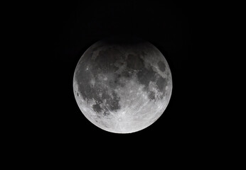 Shadow of the earth during the Partial Harvest Supermoon Lunar Eclipse September 17, 2024 over...