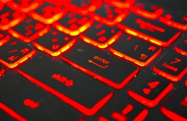 Theme: The series captures the essential elements of a modern keyboard, focusing on functionality and the striking aesthetic of illuminated keys. The red glow against the black keys provides a bold, v