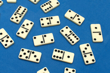 Dominoes bones on blue background	