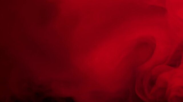 Red fog taking over black background.