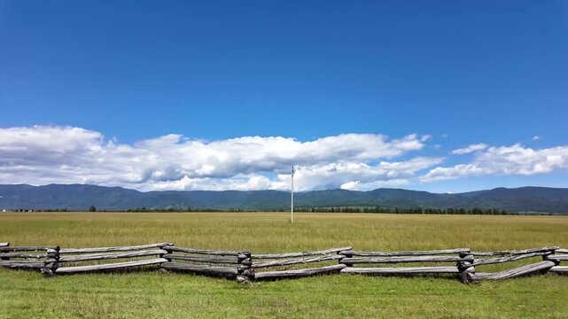 View from the side window of the car to the Tunka mountains. Auto tour of the Tunka Valley, Buryatia