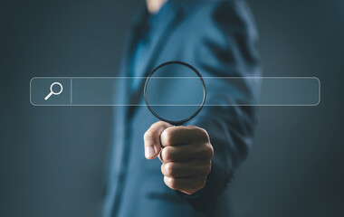 businessman using a laptop shows a search bar, and website to find a job and career on the internet. concept of keyword search engines, web browser information, SEO optimization, tool digital online