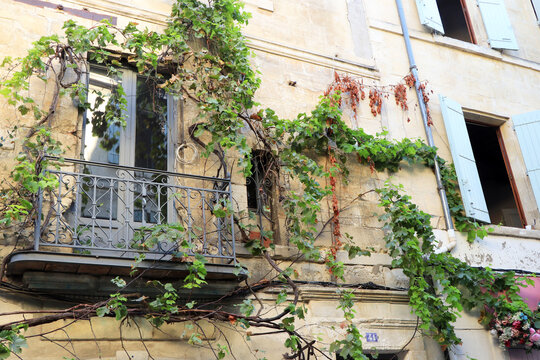 Window balcony in Arles, south of France