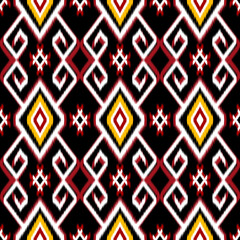 This high resolution image features a traditional geometric ikat pattern in vibrant colors, perfect for use in fashion designs, digital backgrounds, ethnic art projects, and as decorative prints.