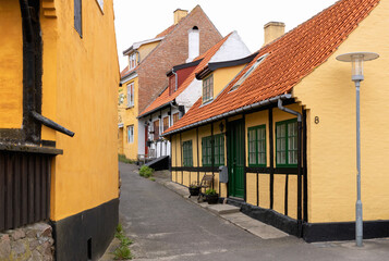 Traditional old residential houses with tiled roofs on the island of Bornholm, Denmark