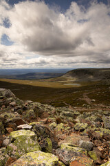 View over the valley in a mountain landscape in the Städjan-Nipfjället nature reserve in Dalarna, Sweden. The mountains Städjan and Nipfjället are located in a nature reserve in Dalarna, Sweden.