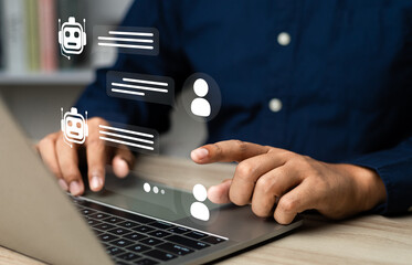 Businessman using AI chatbot conversation assistant in app on device for virtual assistance and customer support digital communication, Contact us Online service with AI Chatbot for efficient support.