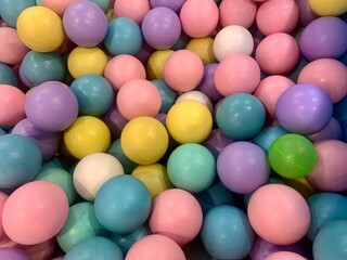 a large pile of colorful plastic balls.